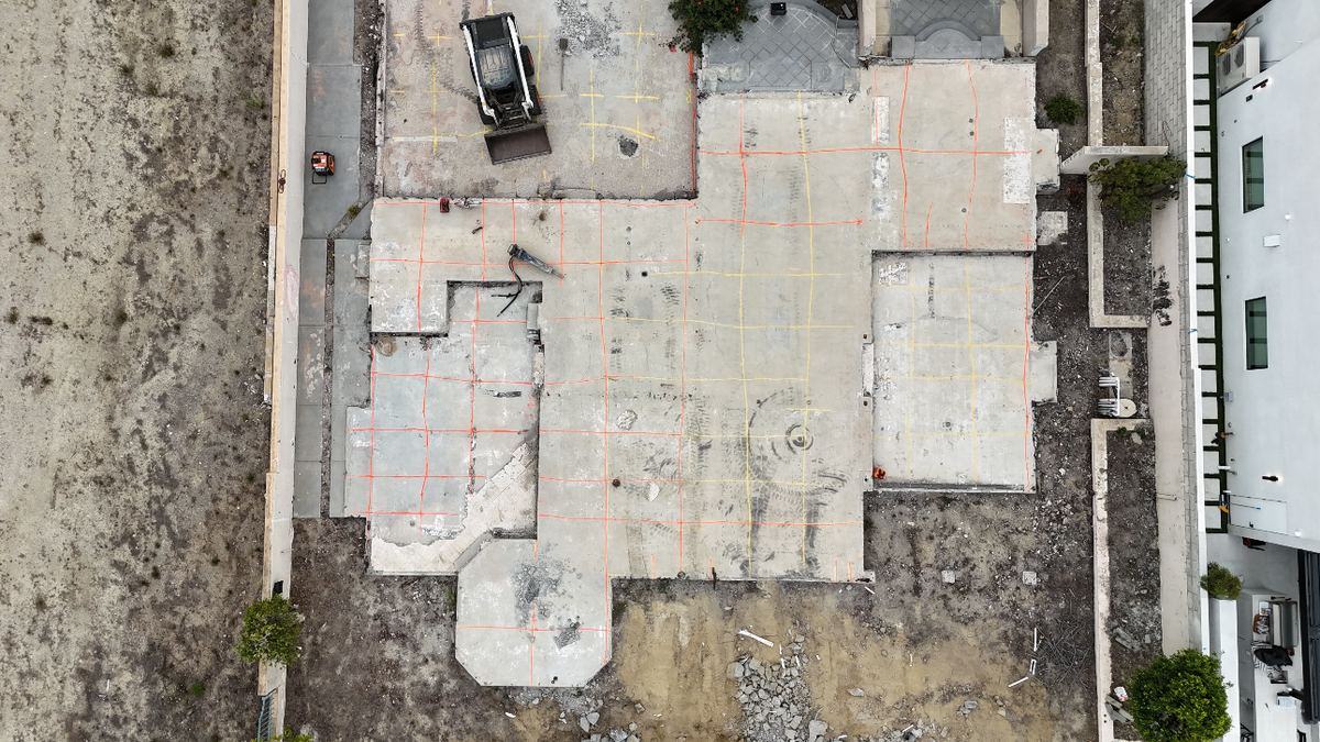 GPR scan of concrete slab marked with utility grid lines during an after-hours night shift scan at an Inland Empire facility